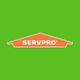 SERVPRO logo on a green background, featuring an orange roof-like shape.