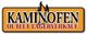 Textlogo "Kaminofen Outlet Lagerverkauf" mit Flammen auf orangenem Hintergrund.