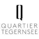 Schwarzes Q über dem Schriftzug "Quartier Tegernsee" auf weißem Hintergrund.