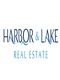 Logo for Harbor & Lake Real Estate, featuring stylized blue text and wave design elements.