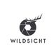 Logo mit Hirschkopf und Kamerablende, darunter der Schriftzug "WILDSICHT" in Großbuchstaben.