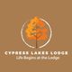 Logo of Cypress Lakes Lodge with an orange tree and the text "Life Begins at the Lodge."