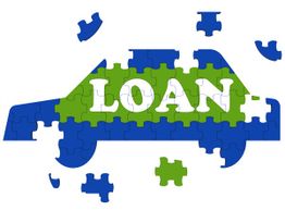 Car-shaped puzzle with "LOAN" text, featuring blue and green pieces.