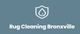 Shield icon with a water droplet above "Rug Cleaning Bronxville" on a blue background.