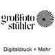 Logo mit Text "großfoto stühler" und "Digitaldruck + Mehr", daneben ein Sternenmotiv.