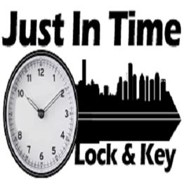 Clock with city skyline silhouette and text: "Just In Time Lock & Key."