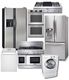 A set of stainless steel kitchen appliances and laundry machines on display.