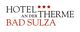 Logo des Hotels "An der Therme" in Bad Sulza. Drei rote Sterne über dem Wort "Therme".