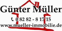 Günter Müller Immobilien-Logo mit Telefonnummer und Webseite, über einem roten Hausumriss.