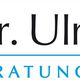 Logo: "Dr. Ulrich Wiek" mit Initialen "UW", Text "Beratung & Training" in Blau.