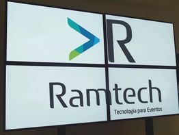 Logotipo da Ramtech, escrito "Tecnologia para Eventos", em uma tela quadriculada.