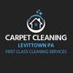 Carpet Cleaning Levittown PA logo with a house and sparkling stars.