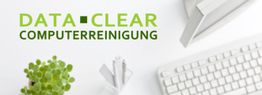 Büroansicht mit Pflanze, Stiftständer und Tastatur. Text: DATA-CLEAR COMPUTERREINIGUNG.