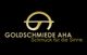 Logo von Goldschmiede AHA mit Slogan "Schmuck für die Sinne" auf schwarzem Hintergrund.