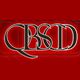 Logo with overlapping letters "QBSD" on a dark red background.