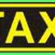 Gelbes "TAXI"-Schild mit schwarzem Hintergrund und gelbem Rand.
