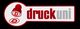 Logo mit roter Mütze und Text "druckuni" links rot, rechts grau, auf schwarzem Hintergrund.