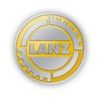 Goldenes Zahnrad-Logo mit der Aufschrift "LANZ" in der Mitte.