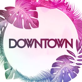 Texto "DOWNTOWN" em círculo branco com folhas coloridas ao redor.