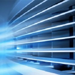 Close-up of a sleek, modern fan with blue lighting blur.