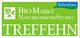 Grünes Schild: "Bio-Markt Naturkosmetikstudio Treffehn", blaues "Reformhaus"-Banner oben rechts.