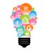 Glühbirne aus bunten Symbolen: Einkauf, Social Media, Vernetzung und mehr.