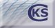 Logo: Dunkelblauer Schriftzug "KS" in ovalem Kreis mit blauen Linien im Hintergrund.