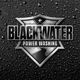 Blackwater Power Washing logo on a wet, textured black background.