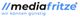 Logo mit Schriftzug "mediafritze" und Slogan "wir können günstig" in Blau und Schwarz.