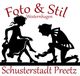 Silhouetten eines Schuhmachers und einer Frau mit Schrift "Foto & Stil, Schusterstadt Preetz".