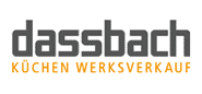 Logo von Dassbach Küchenwerksverkauf mit grauem Schriftzug und orangefarbenem Untertitel.