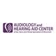Logo of Audiology and Hearing Aid Center, featuring a purple ear icon and text.