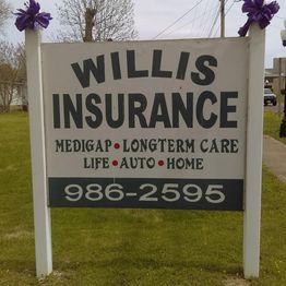 Insurance sign with contact number, offering medigap, longterm care, life, auto, and home services.