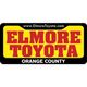 Elmore Toyota logo with website and Orange County text on yellow background.