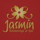 Goldenes Blumenlogo und Schriftzug "Jasmin Thaimassage & Spa" auf rotem Hintergrund.