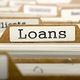 File tab labeled "Loans" in a filing cabinet.