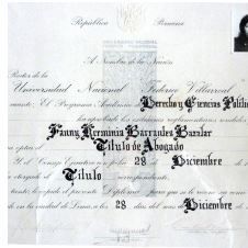 A scanned certificate with ornate text and a small photo in the top right corner.