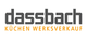 Logo von Dassbach Küchenwerksverkauf mit grauem Schriftzug und orangefarbenem Untertitel.