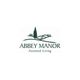 Abbey Manor Assisted Living logo with stylized trees and hills.