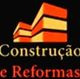 Logotipo com desenho de prédio laranja e amarelo. Texto: "Construção e Reformas". Fundo preto.