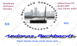 Ein Laptop vor Skyline, umgeben von IT-Dienstleistungen, Text: "Andreas Burkhardt".