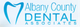 Logo of Albany County Dental Associates with a tooth graphic.