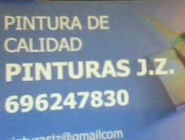 Póster de "Pinturas J.Z." con teléfono 696247830 y correo parcialmente visible.
