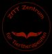 Rotes Logo mit Text "ZfTT Zentrum für Tiertherapeuten" und zwei Händen auf schwarzem Hintergrund.