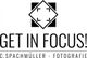 Logo mit Text "GET IN FOCUS!" und "C. Spachmüller - Fotografie" und einem Quadrat mit Ecken.