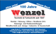 Blau-weiße Anzeige für das 100-jährige Jubiläum der Firma Wenzel, spezialisiert auf Technik und Fortschritt.