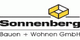Logo von Sonnenberg Bauen + Wohnen GmbH mit gelbem Würfelmotiv.