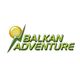 Logo mit gelbem Kreis und grünem Blitz über dem Text "Balkan Adventure" in grüner Schrift.