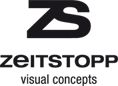Logo mit den Buchstaben "ZS" und Text "zeitstopp visual concepts" in Schwarz.