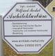 Schild eines Architekturbüros mit Dienstleistungen und Kontaktinformationen.